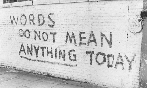 graffiti saying 'words do not mean anything today'